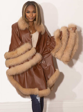 Leather Cape with Fox Fur Trim.