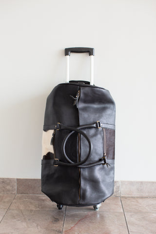 Leather & Cowhide Duffle Bag with Wheels.