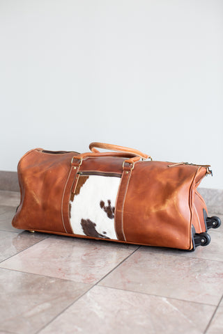 Leather & Cowhide Duffle Bag with Wheels.