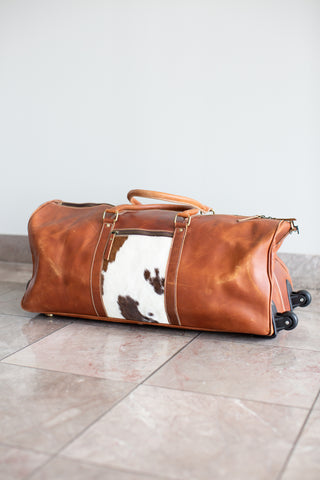 tan leather cowhide duffle bag with wheels\