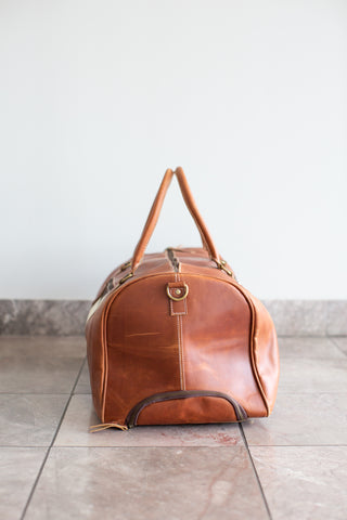 Leather & Cowhide Duffle Bag with Wheels.