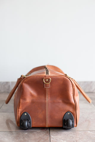 tan leather cowhide duffle bag with wheels\