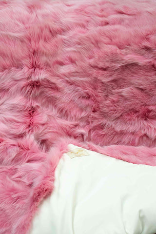 pink sectioned fox fur throw