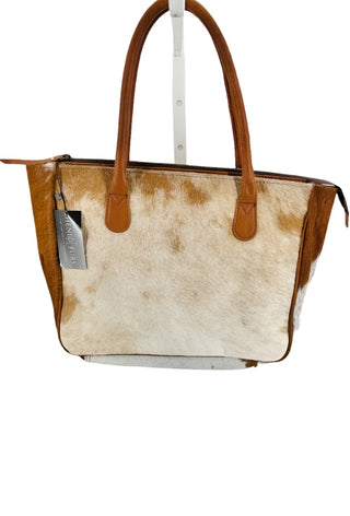 tan and white cowhide leather purse