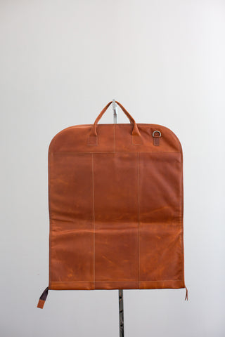 tan leather garment bag