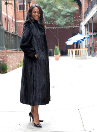 Mink Fur Coat with Shawl Collar and Bracelet Cuffs.